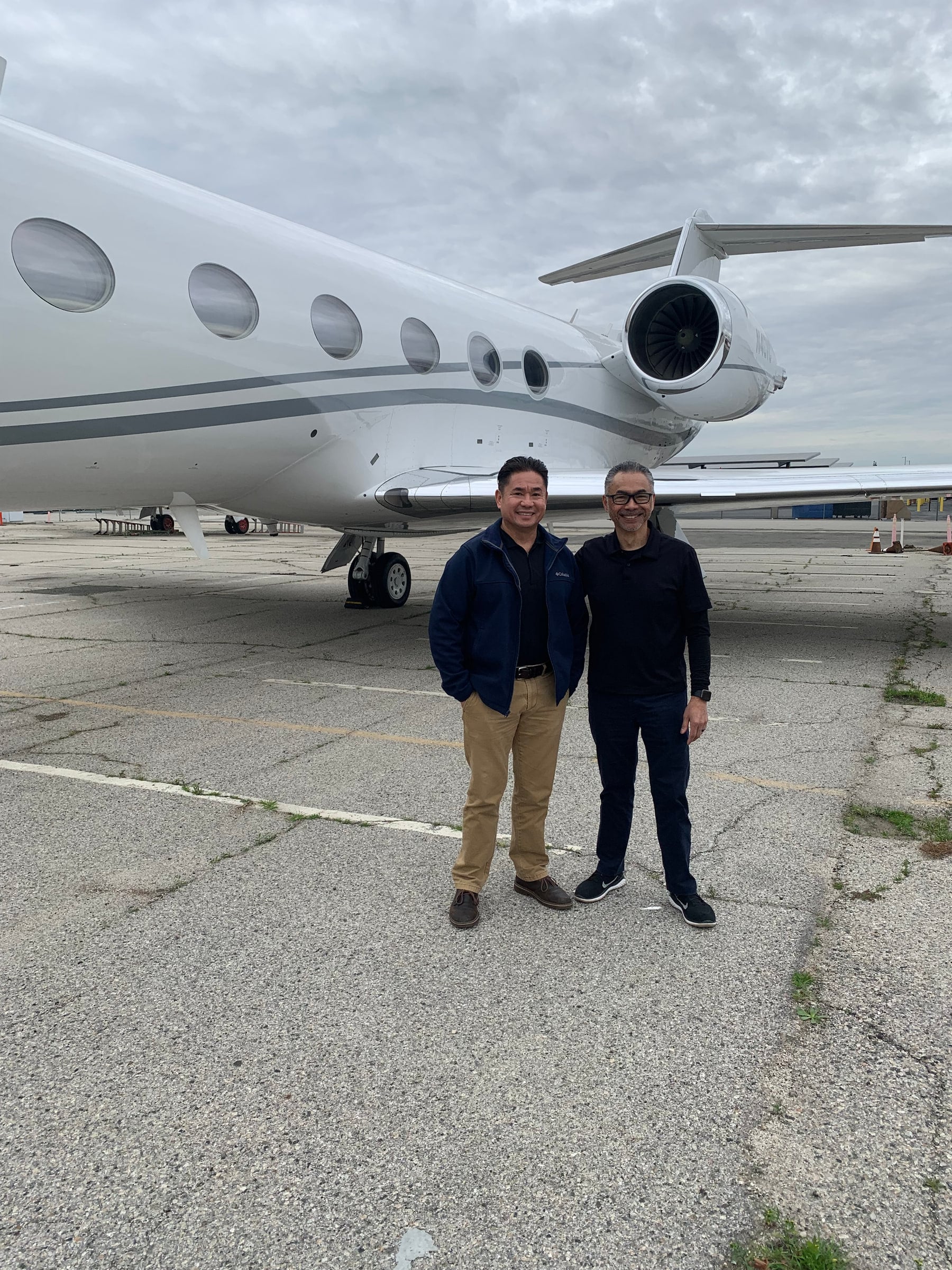 Porfirio and Percy of 4P Partners on the ramp beside a Gulfstream G450